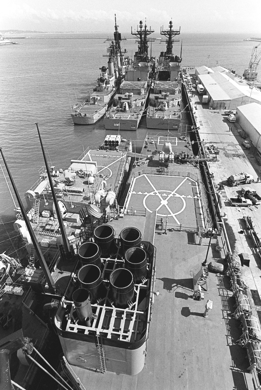 330-CFD-DN-SN-82-07000:  USS Luce (DDG-38), 1982.   A stern view of three U.S. Navy ships tied at the dock during a port visit. The ships are, from left to right: the guided missile destroyer USS Luce (DDG-38), and the destroyers USS Nicholson (DD-982) and USS John Hancock (DD-981), at Casablanca, Morocco.  Photographed by PH1 Douglas P. Tesner, May 1 1982.  Official U.S. Navy Photograph, now in the collections of the National Archives.  