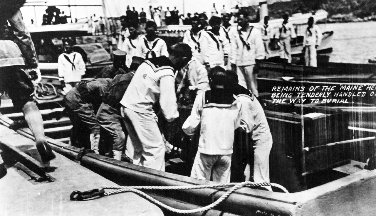 80-G-680177: USS Maine (1895-98), March 1912.  Remains of USS Maine sailors being tenderly handled on the way to burial, March 1912, received 14 September 1955.  Official U.S. Navy Photograph, now in the collections of the National Archives. (2014/04/03).    