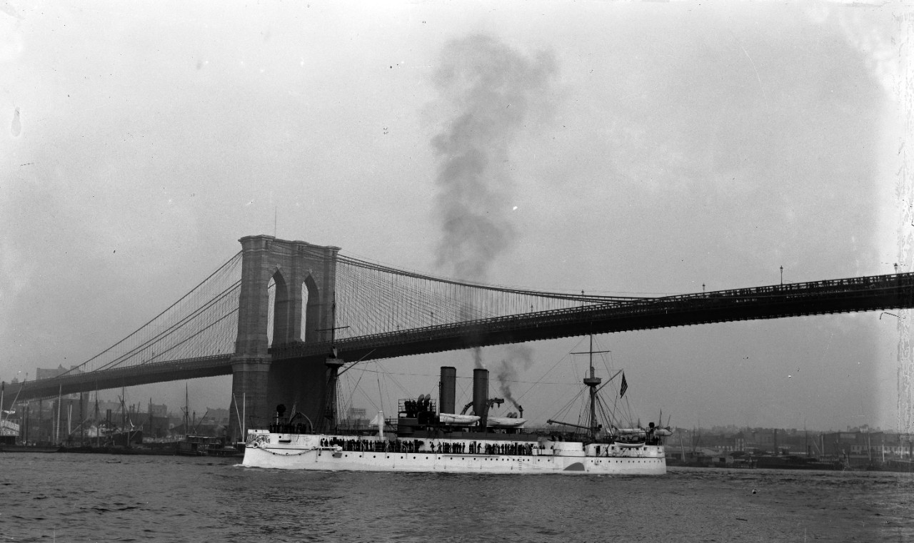 LC-DIG-DET-4a05501:  USS Maine (1895-98).   Port view, passing under Brooklyn Bridge, New York Harbor, New York.  Published by Detroit Publishing Company, 1895-98.  Courtesy of the Library of Congress.    (6/12/2015).
