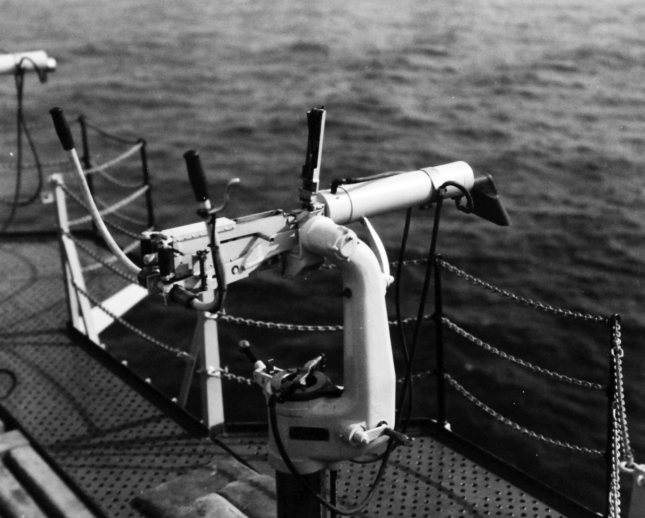 80-CF-CV4-912:   USS Ranger (CV-4), 1939.    Three-fourths view of .50 cal. Machine gun with smoke and flash dissipater attached, October 25, 1939.  .    Official U.S. Navy Photograph, now in the collections of the National Archives.  (2014/12/30).