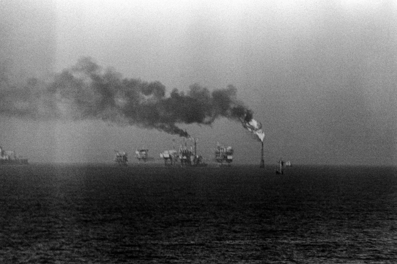 330-CFD-DN-SN-89-03127:   Operation Praying Mantis, April 14, 1988.   A view of Iranian oil platforms, the target of US retaliation for the mining of the guided missile frigate USS Samuel B. Roberts (FFG-58) in the Persian Gulf.   U.S. Navy Photograph, now in the collections of the U.S. National Archives.   