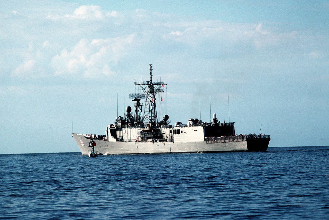 330-CFD-DN-ST-88-10218:  USS Stark (FFG-31).  A port quarter view of the guided missile frigate underway during sea trials after being repaired at Ingalls Shipbuilding, August 28, 1988.  The Stark was damaged when struck by two Iraqi-launched Exocet missiles while on patrol in the Persian Gulf.   U.S. Navy Photograph, now in the collections of the U.S. National Archives. 