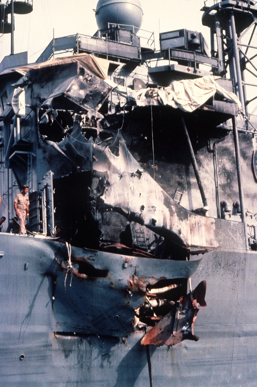 330-CFD-DN-ST-89-01563:  USS Stark (FFG-31), 1988.   A view of damage sustained by the guided missile frigate USS Stark (FFG-31) when it was hit by two Iraqi-launched Exocet missiles while on patrol in the Persian Gulf, May 1987.   U.S. Navy Photograph, now in the collections of the U.S. National Archives.