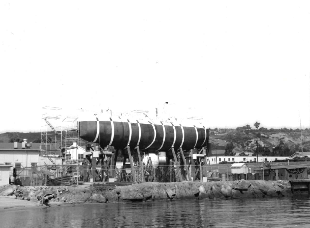 NMUSN-4628:  Bathyscaph Trieste, 1959.   On scaffolding, possibly during testing by the Naval Electronics Laboratory in San Diego, California.    National Museum of the U.S. Navy Photograph Collection. 
