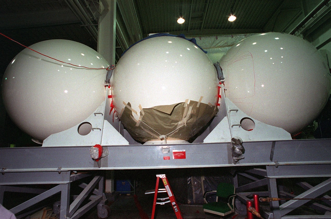 330-CFD-DN-SC-95-01763:   Mystic (DSRV-1), 1995.   Three personnel spheres in storage for use on the deep submergence rescue vehicle, Mystic (DSRV-1), at Naval Air Station, North Island.  Photographed by PH2 Rick Gilmore, USN, January 10, 1995.   Official U.S. Navy Photograph, now in the collections of the National Archives.  (2018/01/02).  