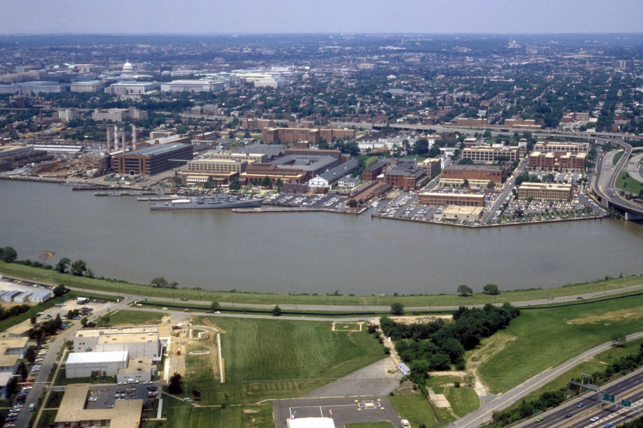 330-CFD-DN-ST-85-09598:  Washington, D.C., circa 1985.    Aerial view of the Washington Navy Yard.  The Forest Sherman class destroyer ex-USS Barry (DD-933) visible in the center was towed in early 2016.    Official U.S. Navy Photograph, now in the collections of the National Archives.      