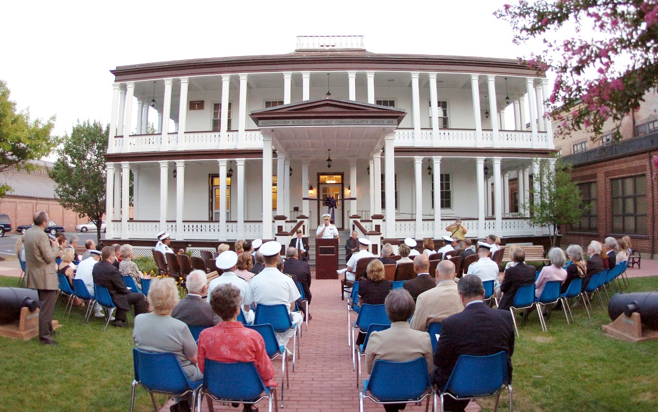 060818-N-3323B-001:  Building 1, Washington Navy Yard, 2006.   Commandant, Naval District Washington, Rear Admiral Terence McKnight, addresses the audience at an official rededication ceremony for the historic commandants office, the Middendorf Building, at the Washington Navy Yard.   The Middendorf Building is the Navy’s oldest active office building on one of the nation’s oldest shore installations.  The building and the Navy Yard were favorite destinations of President Abraham Lincoln during the Civil War.   Photographed by Mass Communication Specialist 3rd Class Jeff Blakley.  Official U.S. Navy Photograph. 