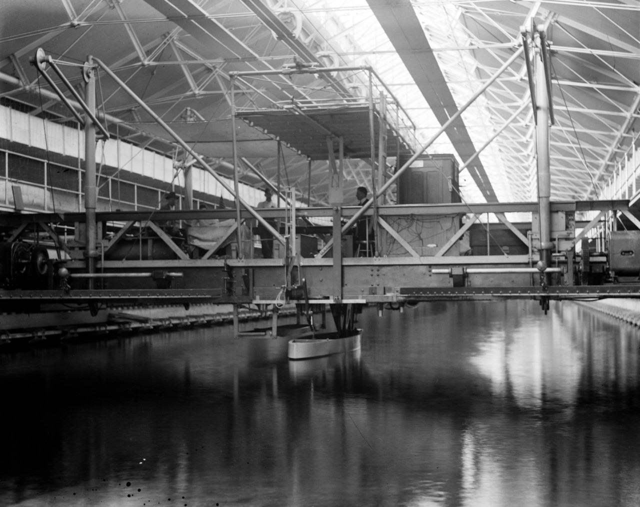 LC-DIG-NPCC-00823:  Experimental Model Basin, Washington Navy Yard, 1918.   Note man on platform.  The Model Basin is now the Cold War Gallery of the National Museum of the U.S. Navy.   Courtesy of the Library of Congress.  