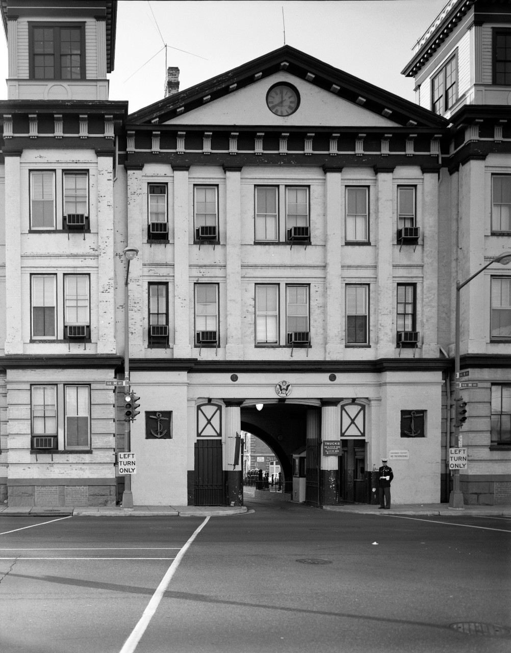 LC-DIG-HEC-030628:  Latrobe Gate, Washington Navy Yard, 1965.    Latrobe Gate and M Streets, Southeast, Washington, D.C., November 1965, Marc Blair of the Historic American Buildings Survey. Note, U.S. Marine standing guard.   Courtesy of the Library of Congress.  