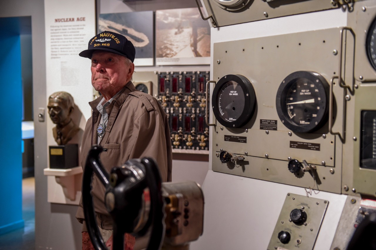 170606-N-TH437-022:   National Museum of the U.S. Navy, Washington Navy Yard, 2017.  Retired Chief Gunner's Mate Hank Kudzik admires the submarine exhibit in the National Museum of the U.S. Navy.  Kudzik served aboard the submarines USS Nautilus (SS 168) at the Battle of Midway, which sank the Japanese aircraft carrier Soryu before operating off the Japanese coast, June 6, 2017.  Kudzik completed 14 war patrols during his time on active duty before retiring.  Official U.S. Navy Photograph by Mass Communication Specialist 1st Class Eric Lockwood.