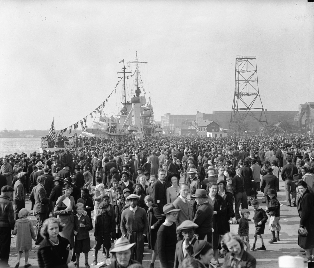 LC-DIG-HEC-25263:   Washington Navy Yard waterfront, 1938.    Navy Day Celebrations, with a view of some of the thousands that visited the Yard and looked the workings of the Navy over.  Photographed by Harris & Ewing, October 27, 1938.   Courtesy of the Library of Congress.  