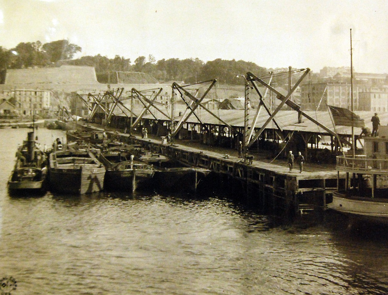 <p>Lot-8308-1: American Expeditionary Forces, WWI. Pier No.3, Port De Commerce, Brest, France. Because of the lack of adequate piers at Brest, it has been necessary to unload most of the troops and cargoes by lighters, although that harbor has practically unlimited water and can accommodate the biggest ships, July 12, 1918. U.S. Army Signal Corps Photograph. Courtesy of the Library of Congress. (2016/11/18).</p>

