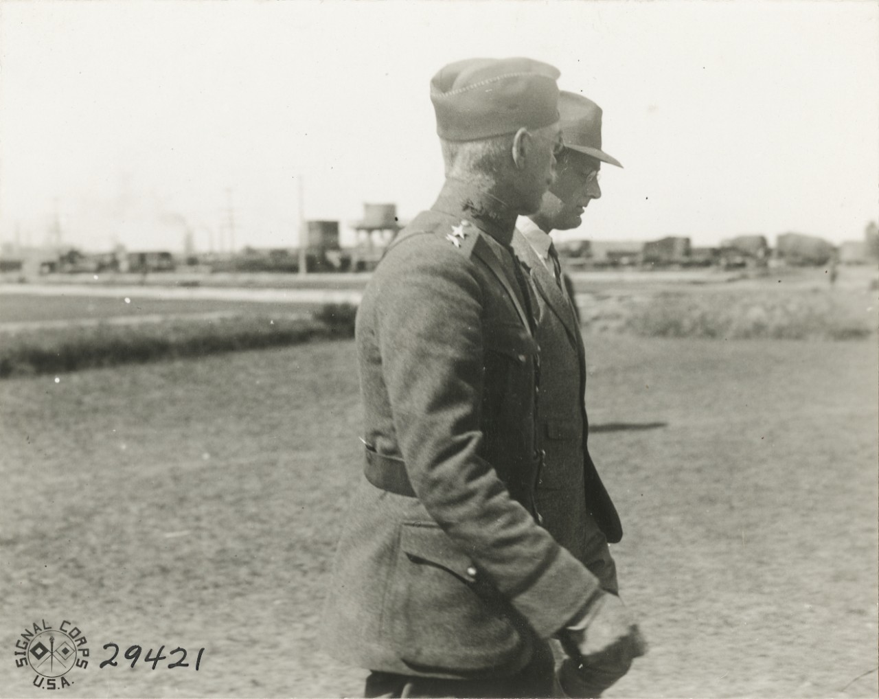 <p>111-SC-29421: Rear Admiral Charles P. Plunkett, USN, and Franklin D. Roosevelt, Assistant Secretary of the Navy on a tour of inspection of U.S. Naval Railway Battery, Montoir, France. Photographed by Corporal L.H. McLaughlin, SC, August 1, 1918. U.S. Army Signal Corps Photograph, now in the collections of the National Archives. Archival photograph taken by Mr. James Poynor.</p>
