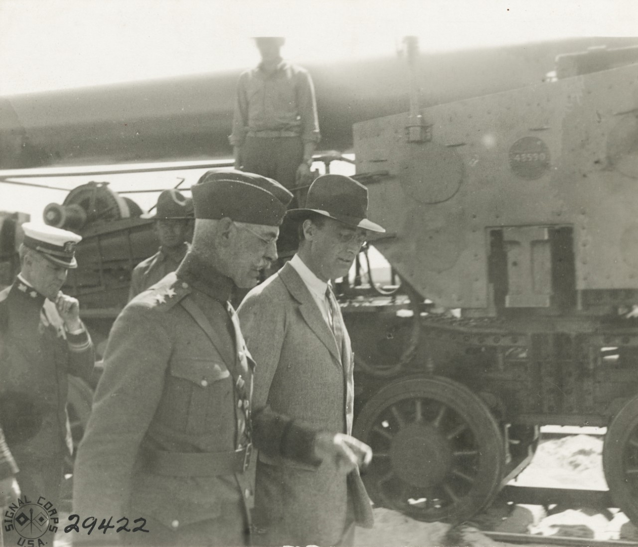 <p>111-SC-29422: Rear Admiral Charles P. Plunkett, USN, and Franklin D. Roosevelt, Assistant Secretary of the Navy on a tour of inspection of U.S. Naval Railway Battery, Montoir, France. Photographed by Corporal L.H. McLaughlin, SC, August 1, 1918. U.S. Army Signal Corps Photograph, now in the collections of the National Archives. Archival photograph taken by Mr. James Poynor.</p>
