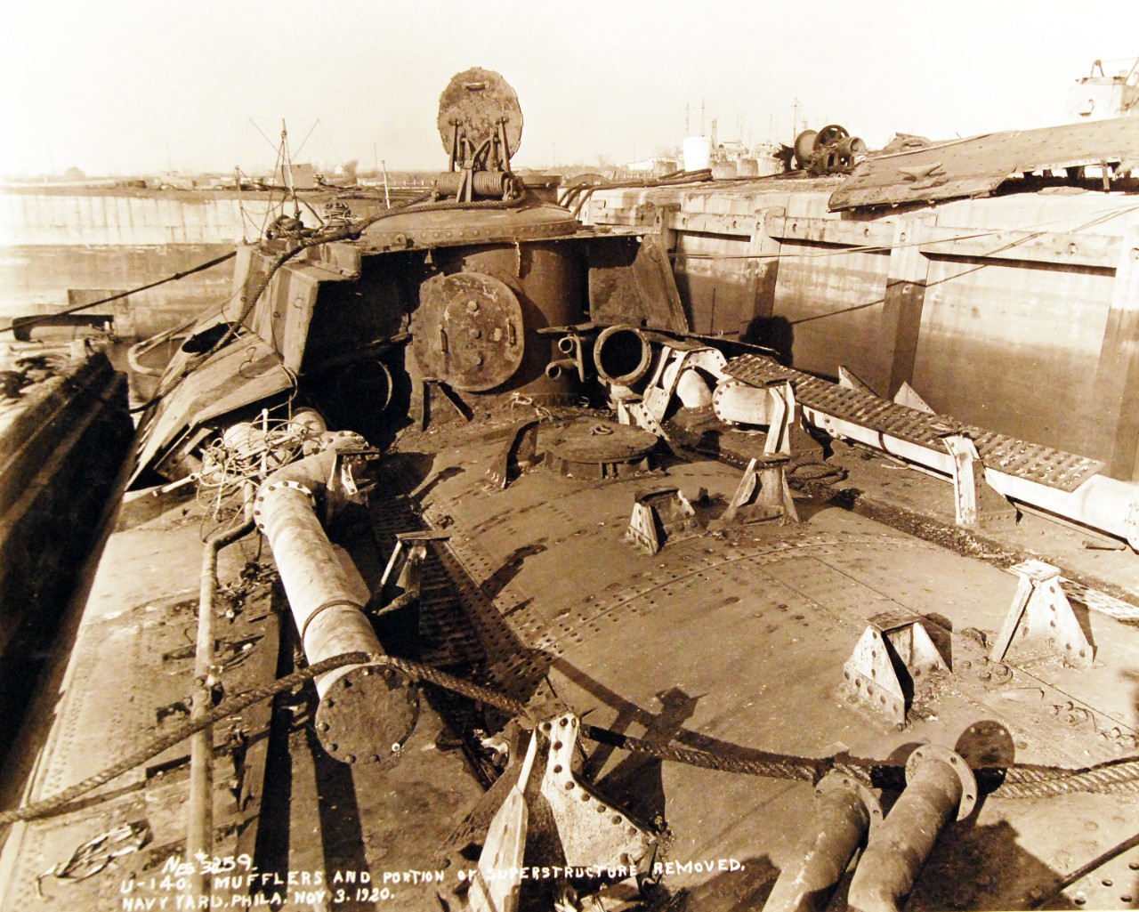 <p>19-N-3859: German submarine, U-140, mufflers and portion of superstructure removed at Philadelphia Navy Yard, Philadelphia, Pennsylvania, November 3, 1920.&nbsp;</p>
