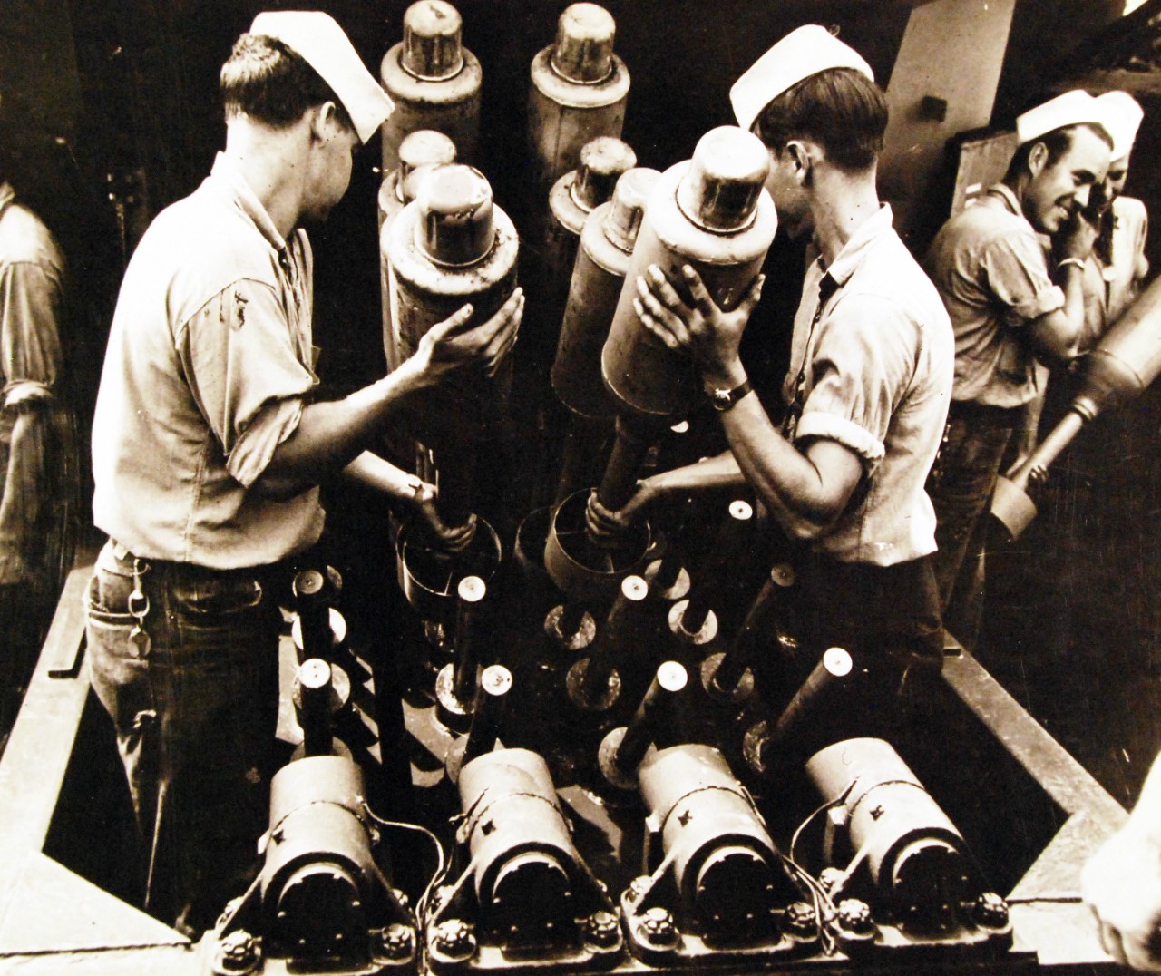 <p>80-G-701378: Battle of the Atlantic: Anti-Submarine Warfare: Hedgehog. “Hedgehog” bomb projectors used in anti-submarine warfare. Photograph released October 1945.&nbsp;</p>
