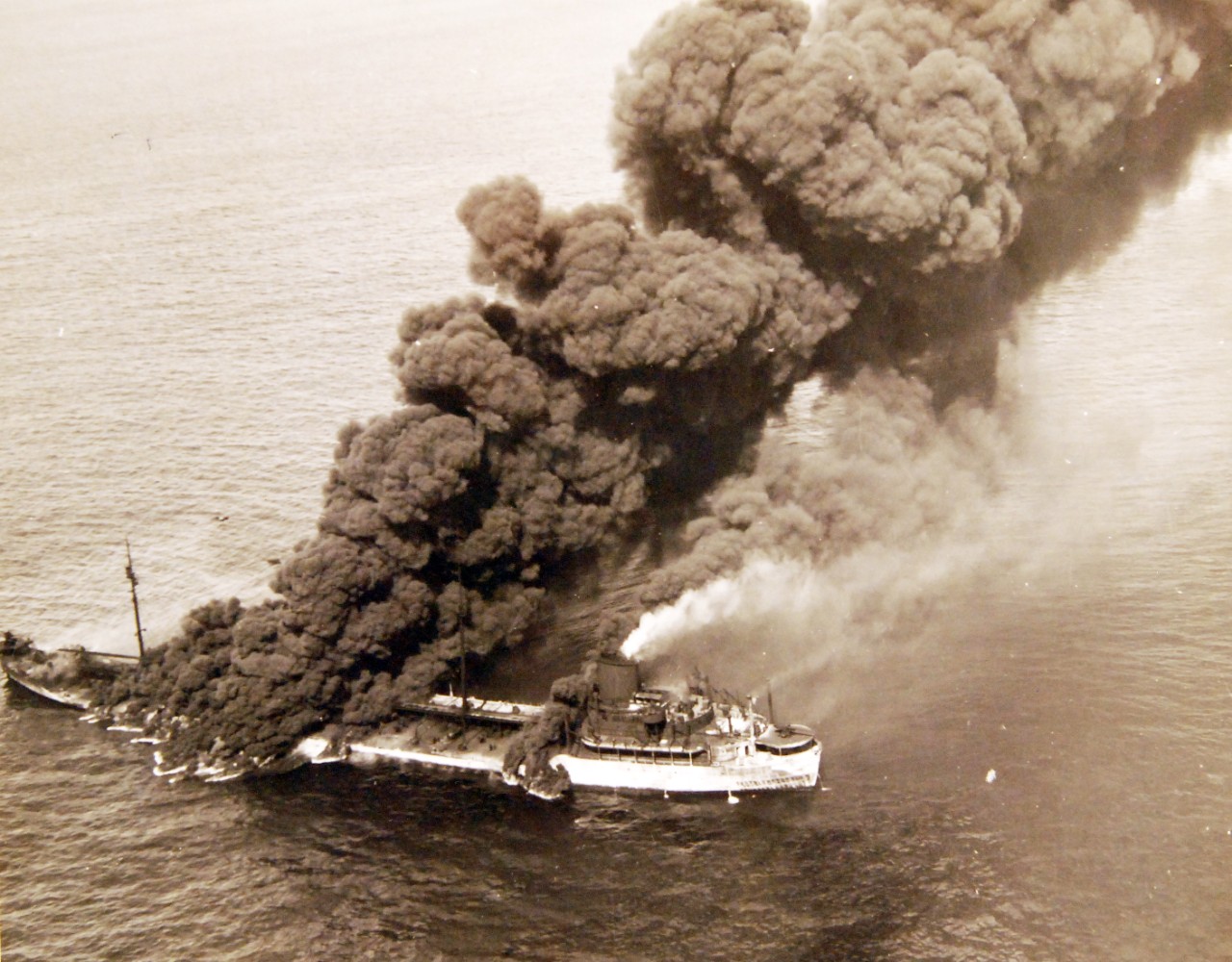 <p>80-G-61573: German U-boat attacks, WWII. SS Pennsylvania Sun burning after being torpedoed amidships by a torpedo by U-571 on July 15, 1942.&nbsp;</p>
