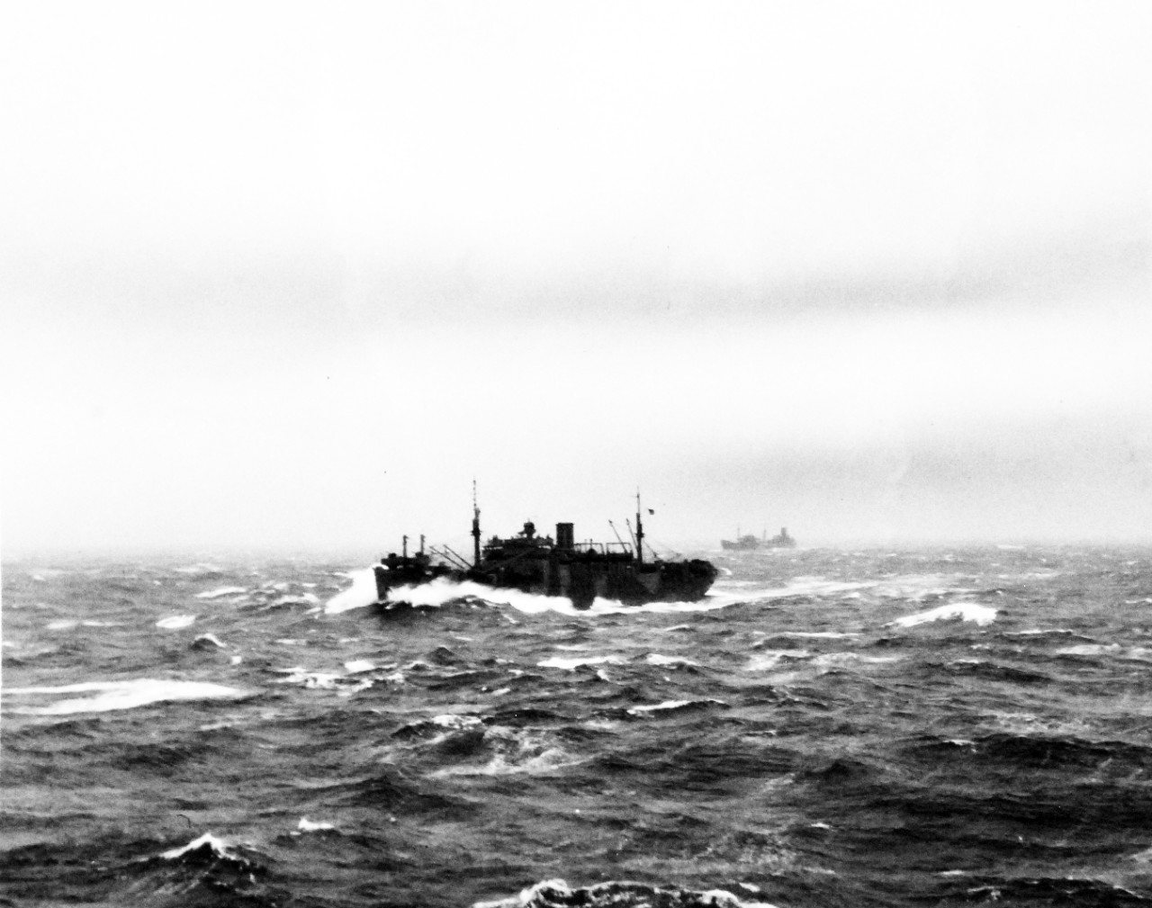 <p class="MsoNormal">80-G-2187:&nbsp; North Atlantic Convoy.&nbsp;&nbsp; Ships passing, February 1942.&nbsp; Vessel is probably USS McCawley (APA 4).&nbsp;&nbsp;</p>
