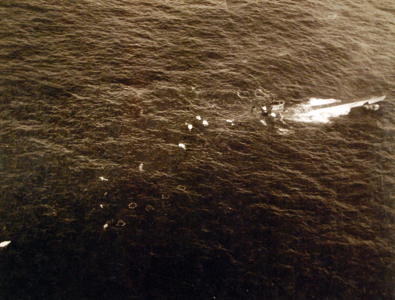 <p>80-G-79393: Air Attacks on German U-boats, WWII. German U-boat incident #3992. Plane attack, August 9, 1943, on German submarine U-664. The submarine is shown sinking after an attack by Lieutenant Junior Grade G.G. Hogan, USNR. Forty-four survivors were picked up and taken onboard USS Card (CVE-11).&nbsp;</p>
