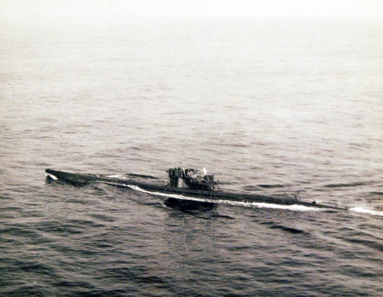 80-G-320286: Surrender of German U-boats, WWII.  U-249 surrendering on May 9, 1945.   U-249 was the first U-boat to surrender after Germany’s surrender.   The submarine surrendered to a PB4Y-1 “Liberator” from FAW-7 off Scilly Islands.  Official U.S. Navy photograph, now in the collections of the National Archives.  (2017/07/18).