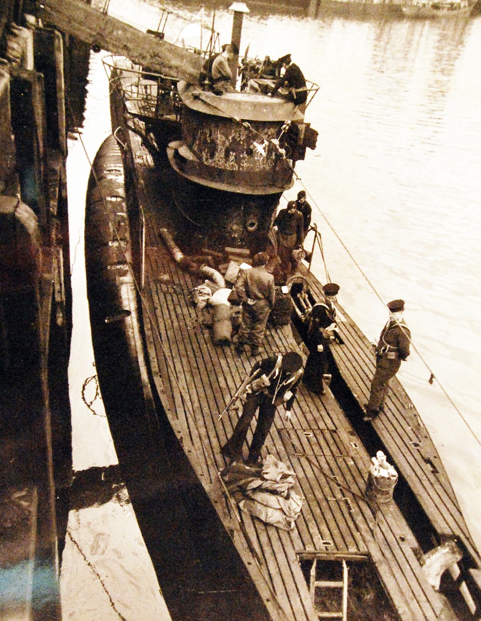 <p>80-G-322612: Surrender of German U-boats, 1945. German submarine, U 249, surrender at Portland, UK, May 10, 1945. Shown: Crew members prepare to go ashore. Commander, Naval Forces, Europe Photograph received May 26, 1945.&nbsp;</p>
