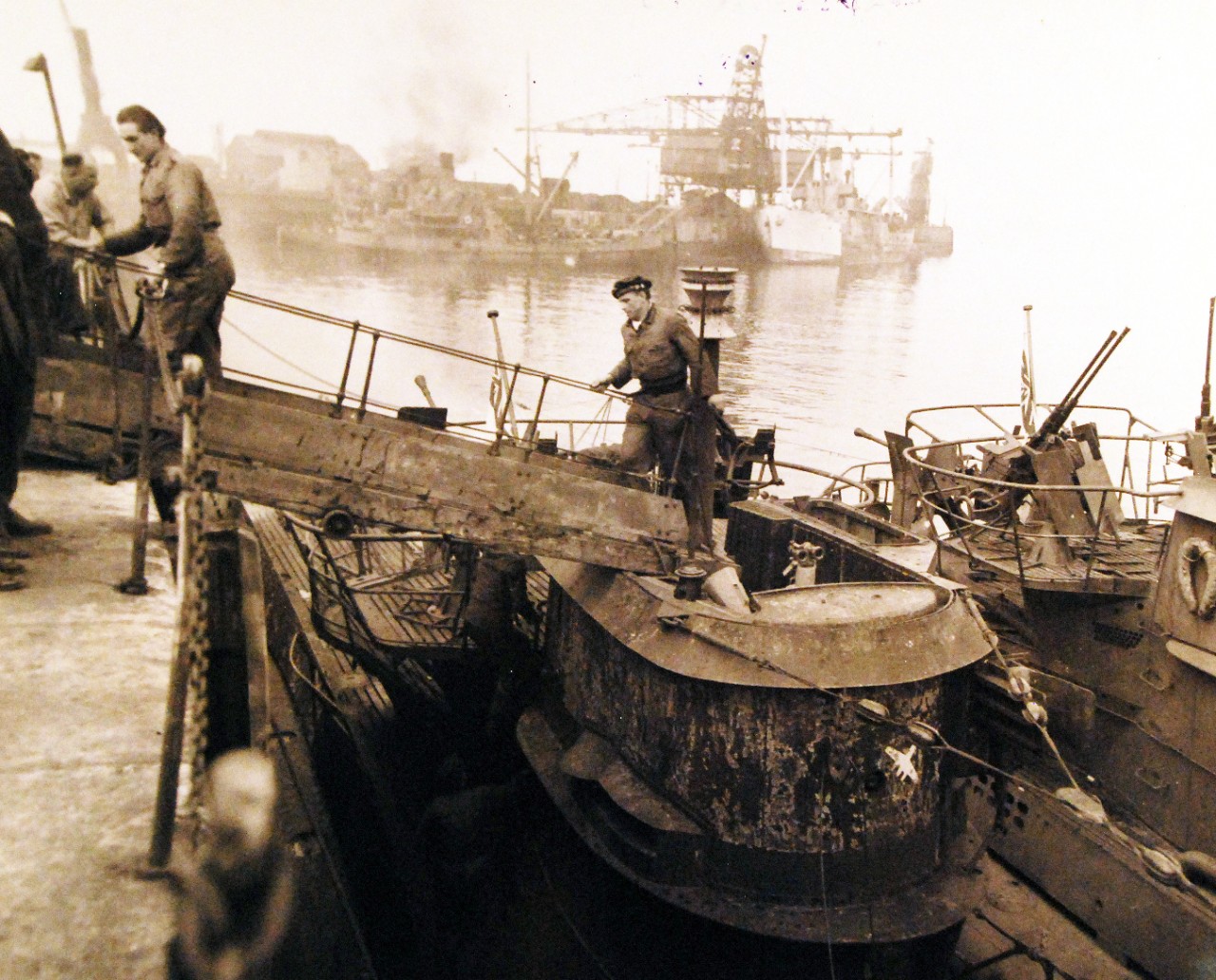 <p>80-G-322623: Surrender of German U-boats, 1945. German submarine, U-249, surrender at Portland, UK, May 10, 1945. Commander, Naval Forces, Europe Photograph received May 26, 1945.&nbsp;</p>
