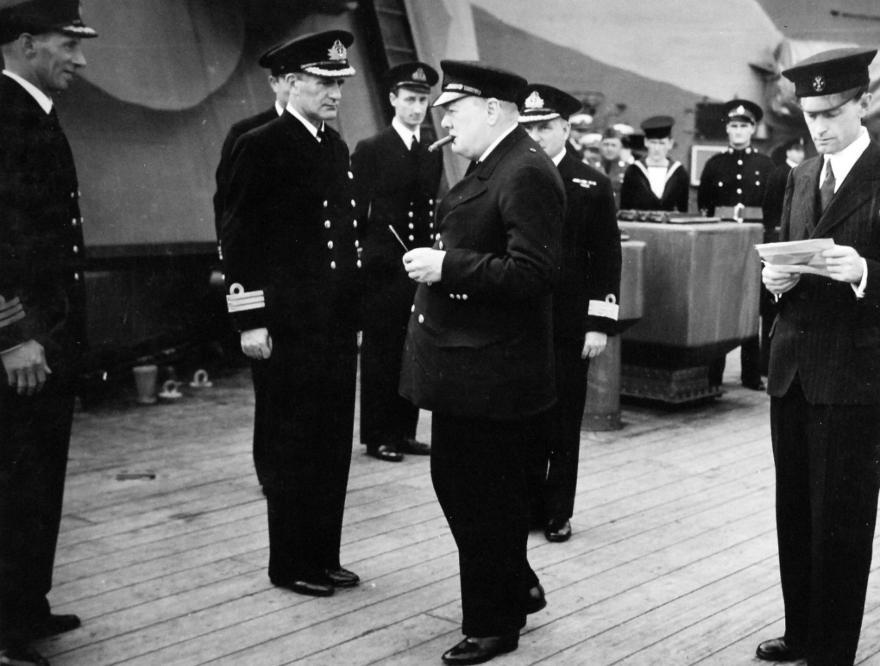 80-G-26872: Atlantic Charter, August 1941.  Prime Minister Churchill shown during ceremonies onboard HMS Prince of Wales during the Atlantic Charter.    Photograph released August 1941.   Official U.S. Navy Photograph, now in the collections of the National Archives.  (2016/03/22).