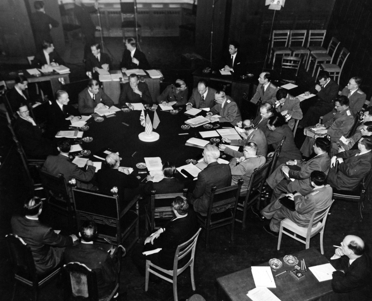 80-G-700116: Potsdam Conference, July-August 1945.  The “Little Three” (Foreign Ministers) meeting in the same conference room as the Heads of States at Potsdam, Germany.  Foreign Minister Anthony Eden at upper left, Secretary of State James F. Byrnes, and lower left, Foreign Commissar V. Molotov, extreme right.  Photographed released July 24, 1945.  Official U.S. Navy Photograph, now in the collections of the National Archives.  (2016/02/23).