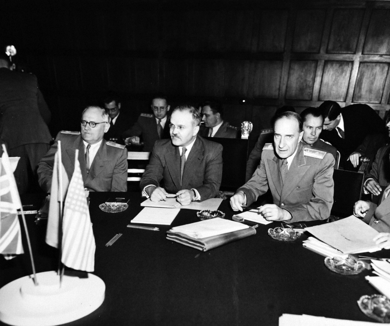 80-G-700118: Potsdam Conference, July-August 1945.  The “Little Three” (Foreign Ministers) meeting in the same conference room as the Heads of States at Potsdam, Germany.  Foreign Commissar V. Molotov in the center.  Photographed released July 24, 1945.  Official U.S. Navy Photograph, now in the collections of the National Archives.  (2016/02/23).