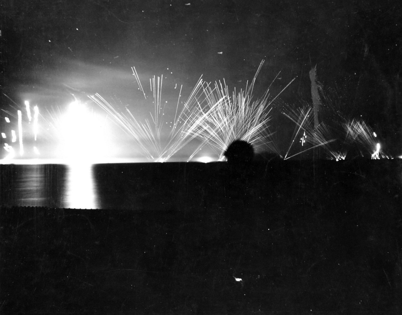 80-G-87329:  Operation Avalanche, September 1943.  Anti-aircraft fire during a night raid in the Gulf of Salerno, Italy.  Photograph released September 12, 1943.   U.S. Navy photograph, now in the collections of the National Archives.  (2017/04/04).
