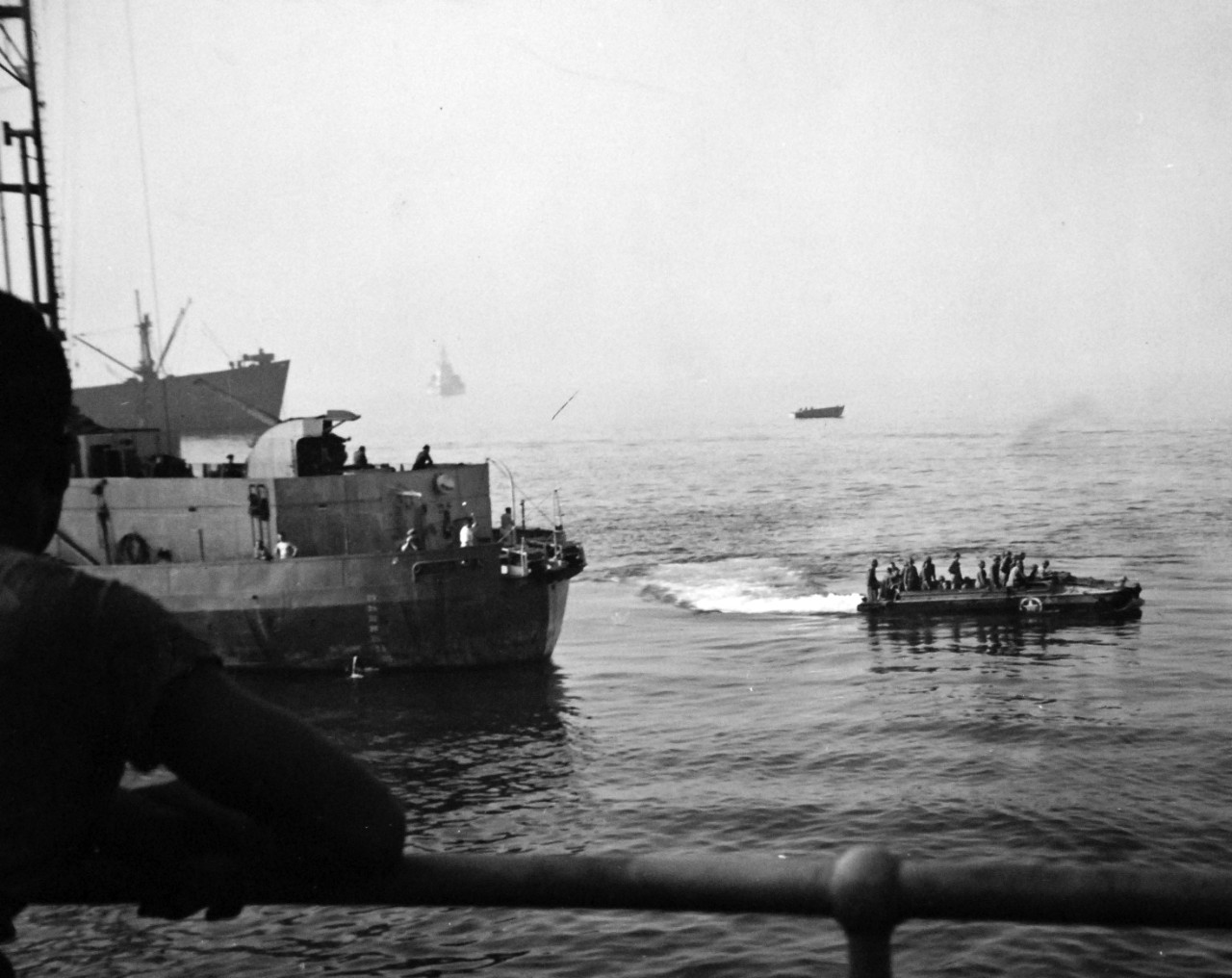 80-G-87331:  Operation Avalanche, September 1943.  Loaded “Duck” passes USS Ancon (AGC 4) on way to beach on D-Day at Salerno, Italy.  Photograph released September 12, 1943.   U.S. Navy photograph, now in the collections of the National Archives.  (2017/04/04).