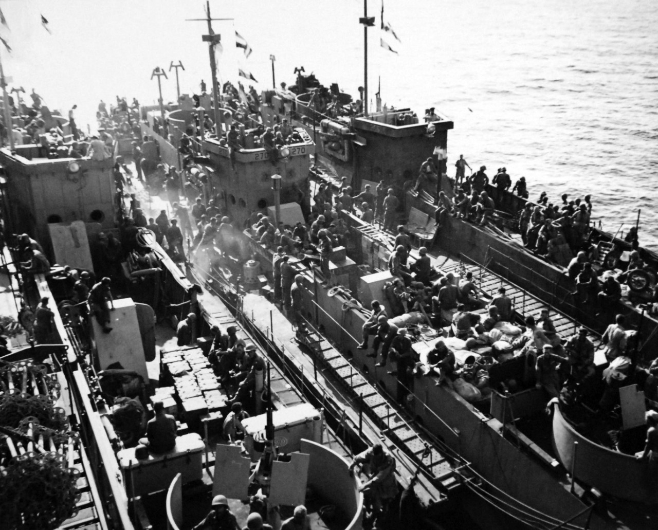 80-G-87395:  Operation Avalanche, September 1943.  American air-borne troops rest aboard English LCI’s before going into battle for Salerno, Italy.    Photograph released September 12, 1943.     U.S. Navy photograph, now in the collections of the National Archives.  (2017/04/04).
