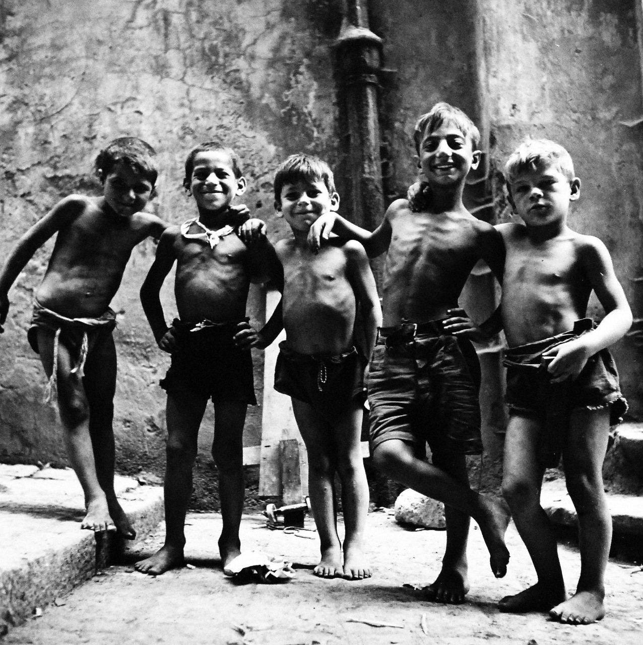 80-G-474129:  Naples, Italy, August 1944.   Children in Naples, Italy.  A group of little Italian boys pose.  Steichen Photograph Unit:  Photographed by Lieutenant Wayne Miller, August 1944.    TR-11307.   Official U.S. Navy Photograph, now in the collections of the National Archives. (2015/12/08).