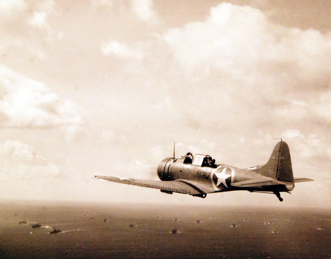 <p>80-G-30216: Operation Torch, November 1942. SBD Dauntless planes from USS Ranger (CV-4) en route to invade French North Africa. The aircraft flies on anti-submarine patrol.&nbsp;</p>
