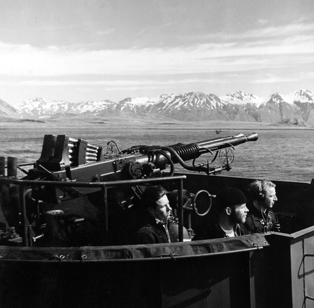 80-G-475686:  Aleutian Islands Campaign, June 1942 - August 1943.  Battle of Attu, May 11-29, 1943.  40mm gun and crew aboard USS Casco (AVP-12) anchored off Attu.  Photographed released by the Steichen Photographic Unit:  Lieutenant Commander Horace Bristol, July 1943.    TR-5274.    U.S. Navy photograph, now in the collections of the National Archives.  (2015/11/17).