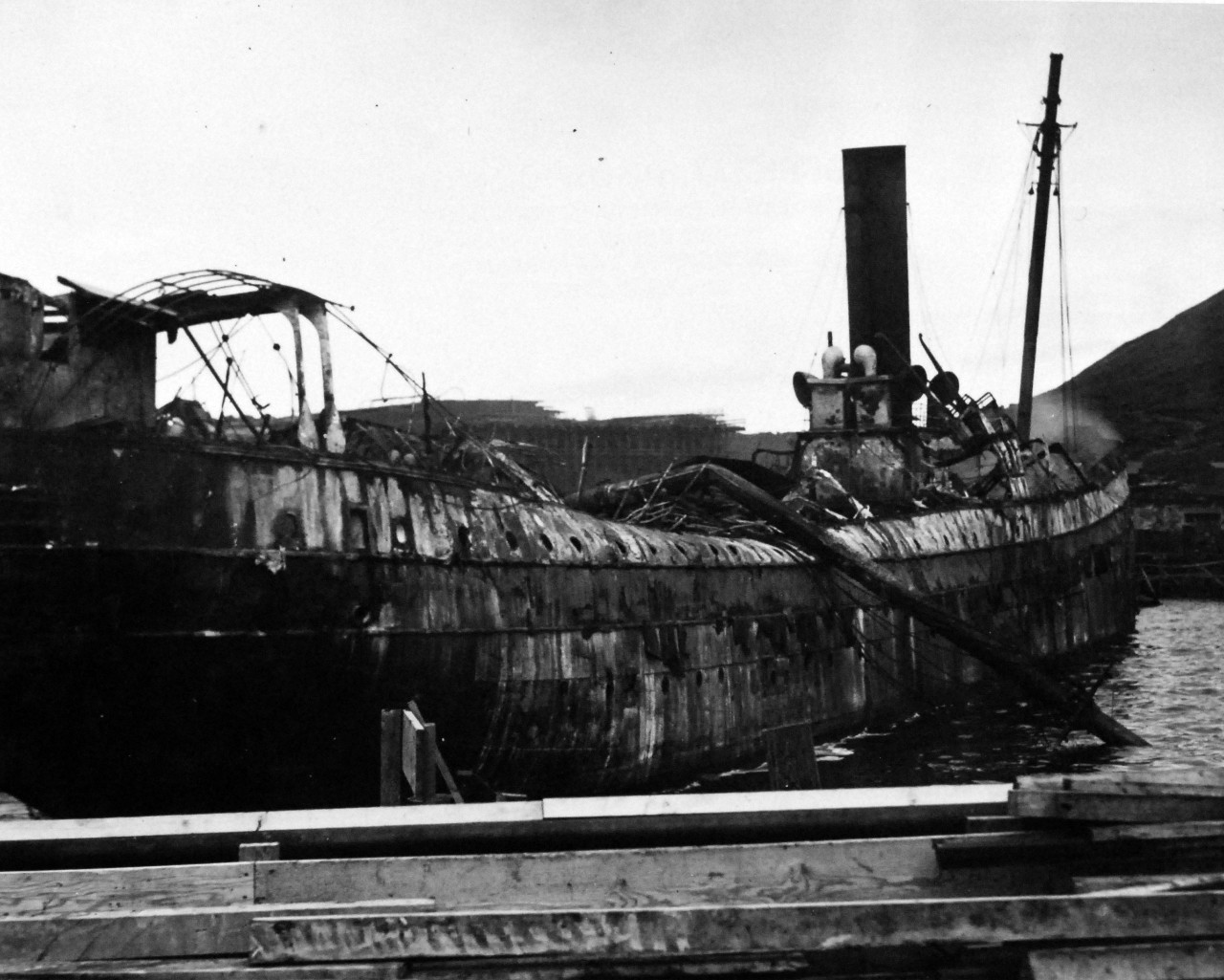 80-G-602:  Attack on Dutch Harbor,  Alaska,  June 1942.   SS Northwestern after bombing and fire.  Photographed on 6 June 1942.    Official U.S. Navy Photograph, now in the collections of the National Archives.    (2014/5/29).