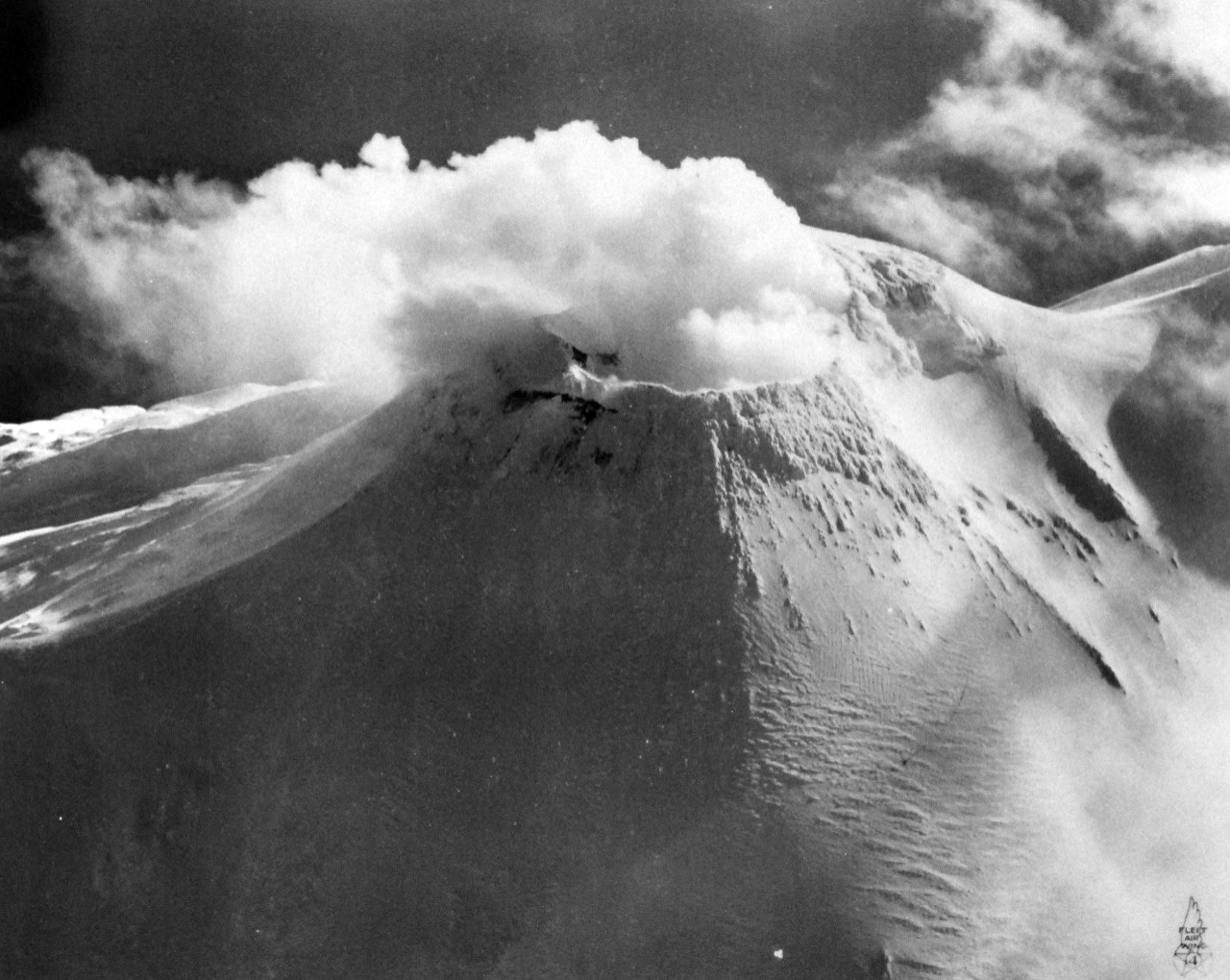 80-G-265346:      Gareloi Island, Aleutian Islands, 1944.    Snow-covered volcanoes looking south, south east, at an altitude of 8000 feet, 1 February 1944.    Official U.S. Navy Photograph, now in the collections of the National Archives.   (2014/7/9).
