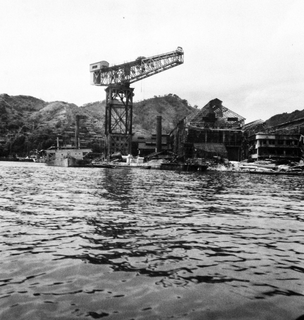 80-G-264879:  Nagasaki, Japan, 1945.   Showing the bomb damage on the waterfront from August 9, 1945.  Photographed by crew of USS Chenango (CVE-28), released September 14, 1945.  Official U.S. Navy photograph, now in the collections of the National Archives.   (2015/12/01).