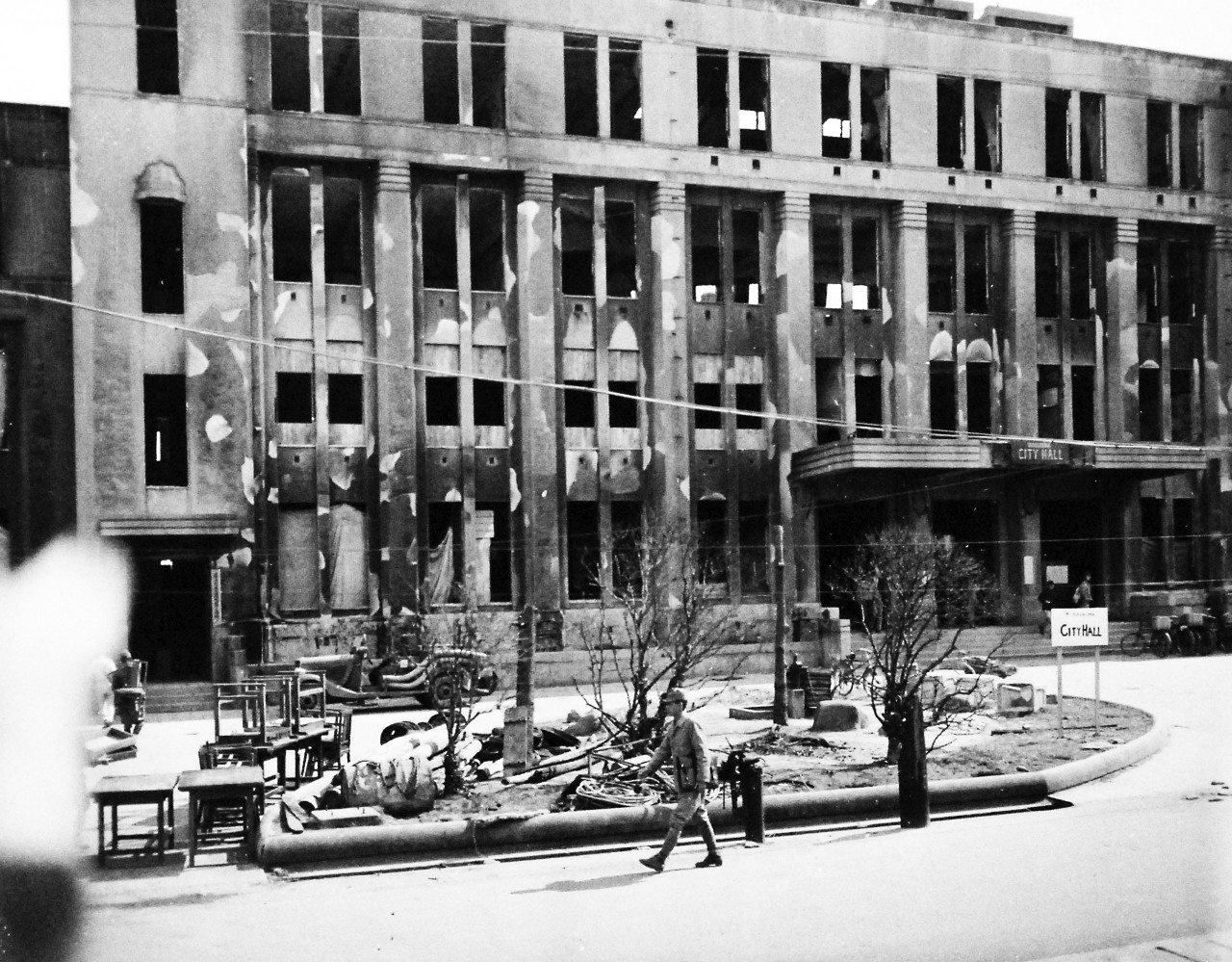 80-G-354618: Hiroshima, Japan, 1945.   Atomic Bomb Damage to Hiroshima, as seen by USS Appalachian (AGC-1).   The City Hall.   Photographed by PhoM3/C George Almarez.  Photographed received October 26, 1945.     U.S. Navy photograph, now in the collections of the National Archives.  (2016/06/21).