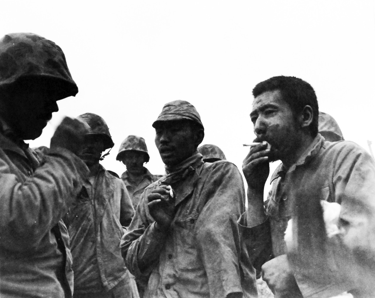 127-GW-327-115120:   Battle for Iwo Jima, February-March 1945.   Two Japanese Prisoners of War taken by K Company, Third Battalion, Twenty-First Marines.  Photographed by Sergeant Scheer, March 21, 1945.  Official U.S. Marine Corps Photograph, now in the collections of the National Archives.  (2014/6/19). 