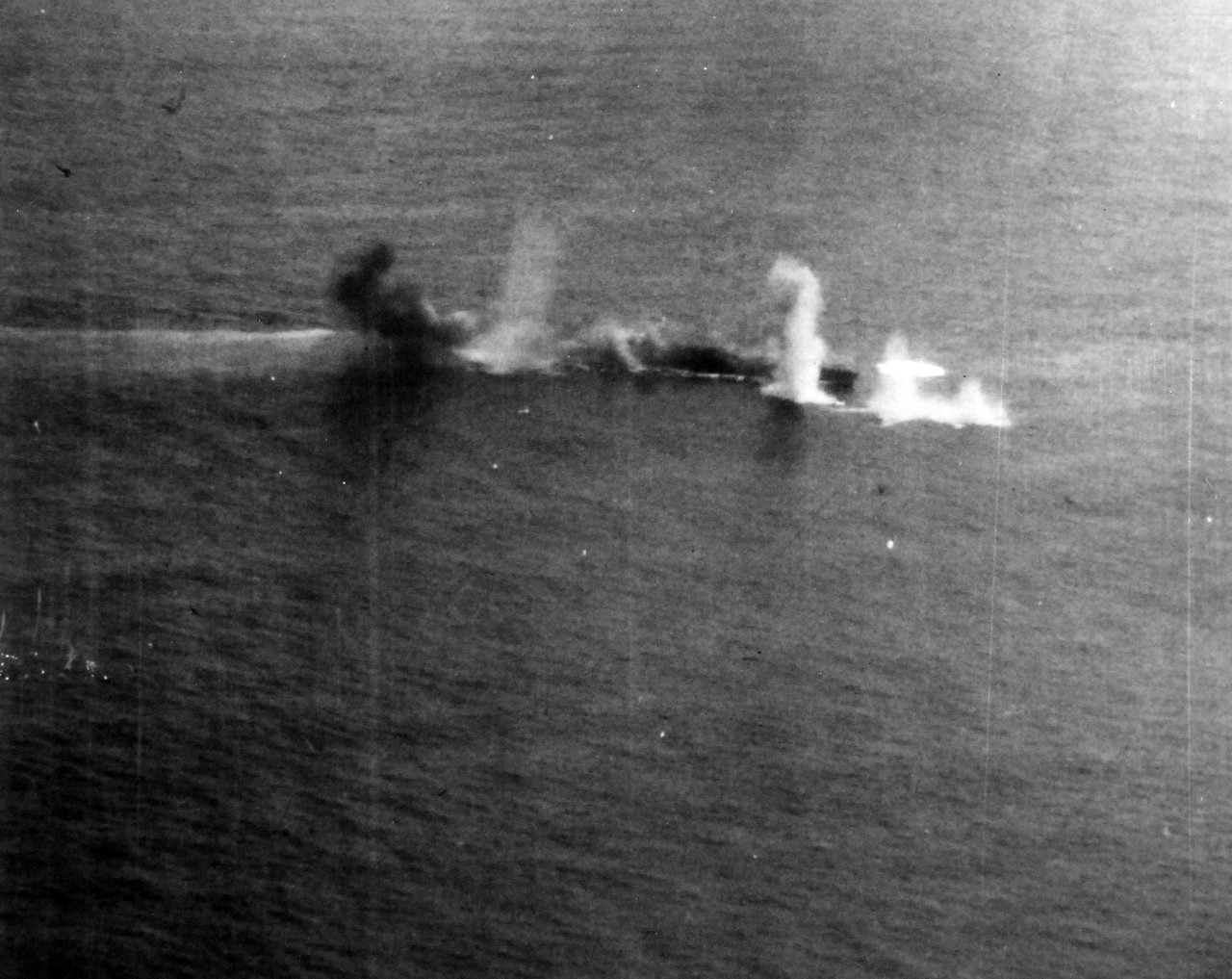 80-G-272554:   Battle of the Sibuyan Sea, October 24, 1944.  Japanese warships under attack by carrier-based planes at Northeast Luzon.  Taken from by a plane from USS Franklin (CV-13).   Official U.S. Navy Photograph, now in the collections of the National Archives.  (2014/5/15).