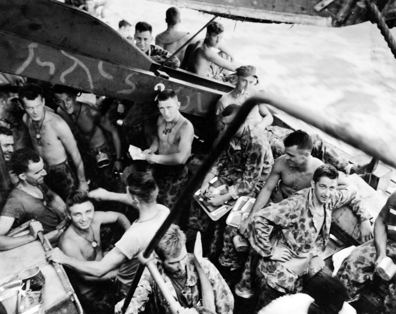 80-G-202476:   Bougainville Campaign, November 1943-August 1945.    USS Kilty (APD-15).   U.S. Marines awaiting chow enroute to Empress Augusta Bay to reinforce beachhead established on November 1.   Photographed November 5, 1943.  Official U.S. Navy Photograph, now in the collections of the National Archives.  (2018/02/21).  