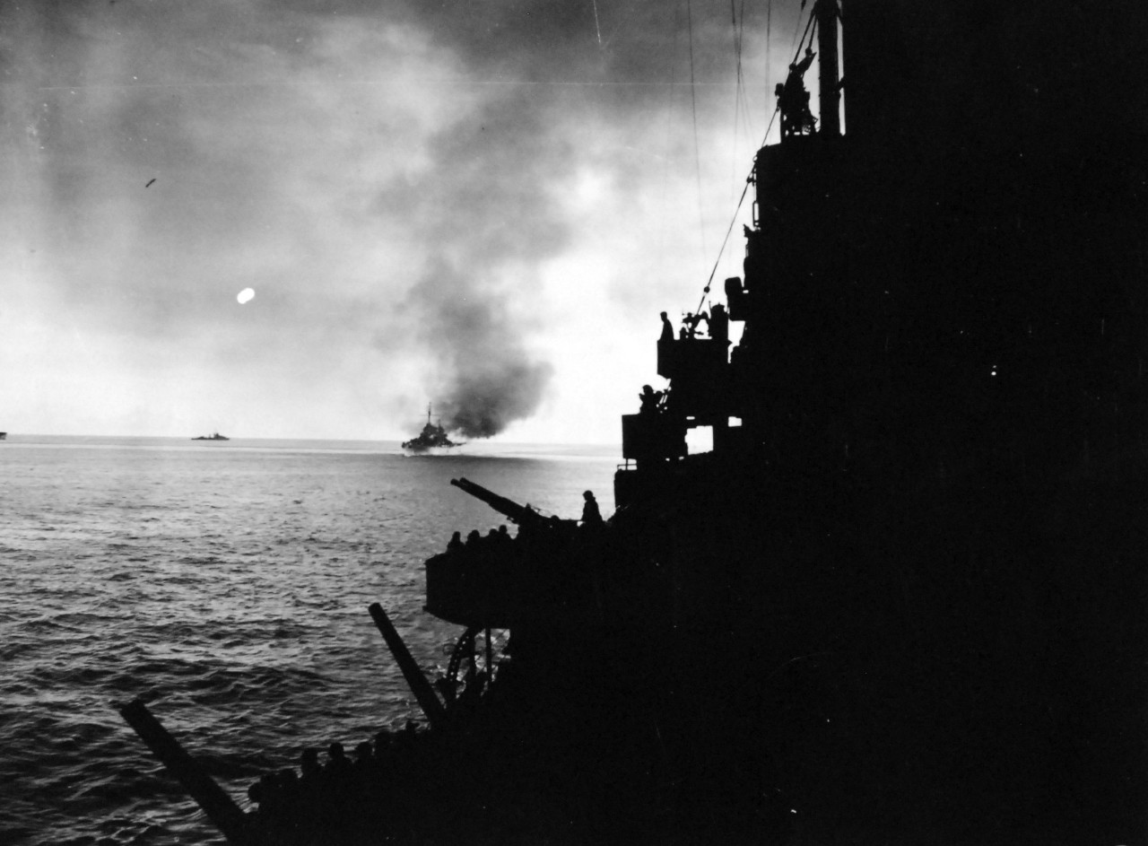 80-G-57443:   Bombardment of Cape Gloucester, New Britain by the guns of USS Nashville (CL-43), December 24-26, 1943.   Official U.S. Navy Photograph, now in the collection of National Archives (2018/04/25). 