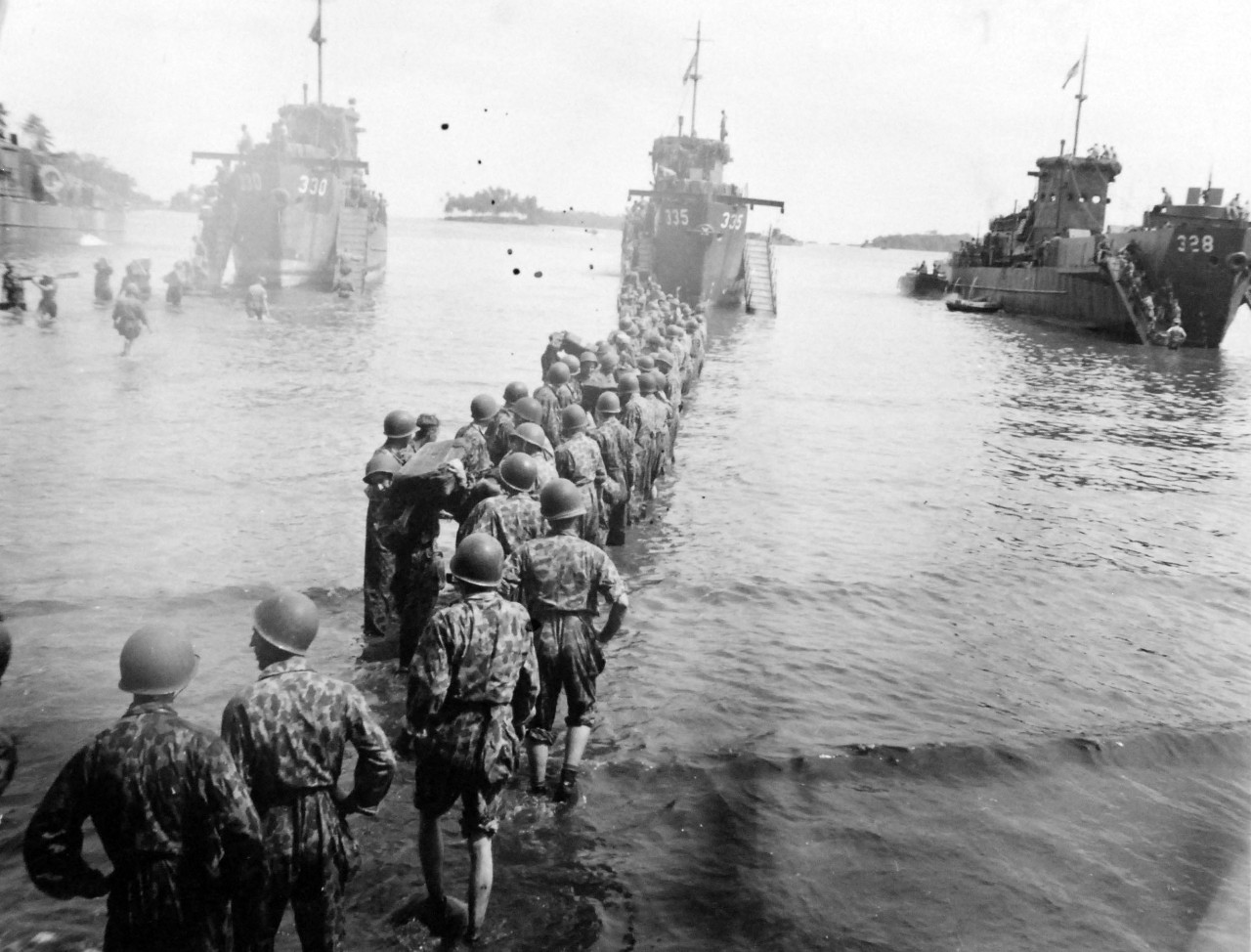 80-G-52705:   Rendova Island Invasion, June 30, 1943. Troops during the invasion aboard Landing Craft Infantry (Large), LCI (L) 330, LCI(L) 335 and LCI(L) 328.   Official U.S. Navy Photograph, now in the collections of the National Archives.  (2018/04/04).  
