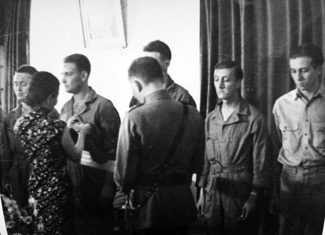 111-SC-148534:  Decoration of Tokyo Fliers by Madame Chiang Kai Shek at Chungking, China, June 29, 1942.  Shown:  Enlisted men receive awards from Madame Shek.  U.S. Army Photograph, now in the collections of the National Archives.  (2017/05/02).