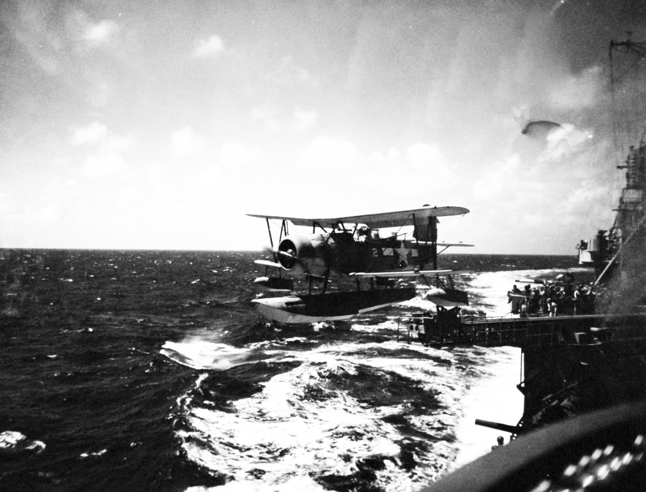 80-G-55243:   Wake Island Raid, October 5-6, 1943.     The SOC that directed the firing in the bombing of Wake Island, October 5, 1943, is shown on the catapult of USS Minneapolis (CA 36).  Photographed by CPU-7.  U.S. Navy photograph, now in the collections of the National Archives.    (2015/04/28).