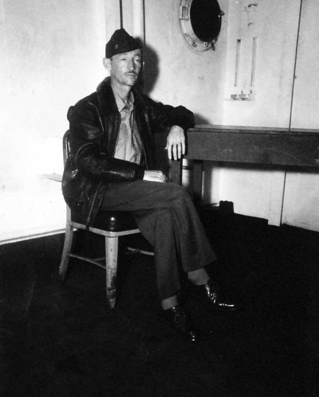 <p>80-G-347911: Allied Prisoners of War, Wake Island. Lieutenant Colonel J.M. Devereux, USMC, hero of Wake Island onboard USS Monitor (LSV-5) at North docks, Yokohama, Japan. Photographed by CPHOM D.W. Wongfield and received September 23, 1945.&nbsp;</p>

