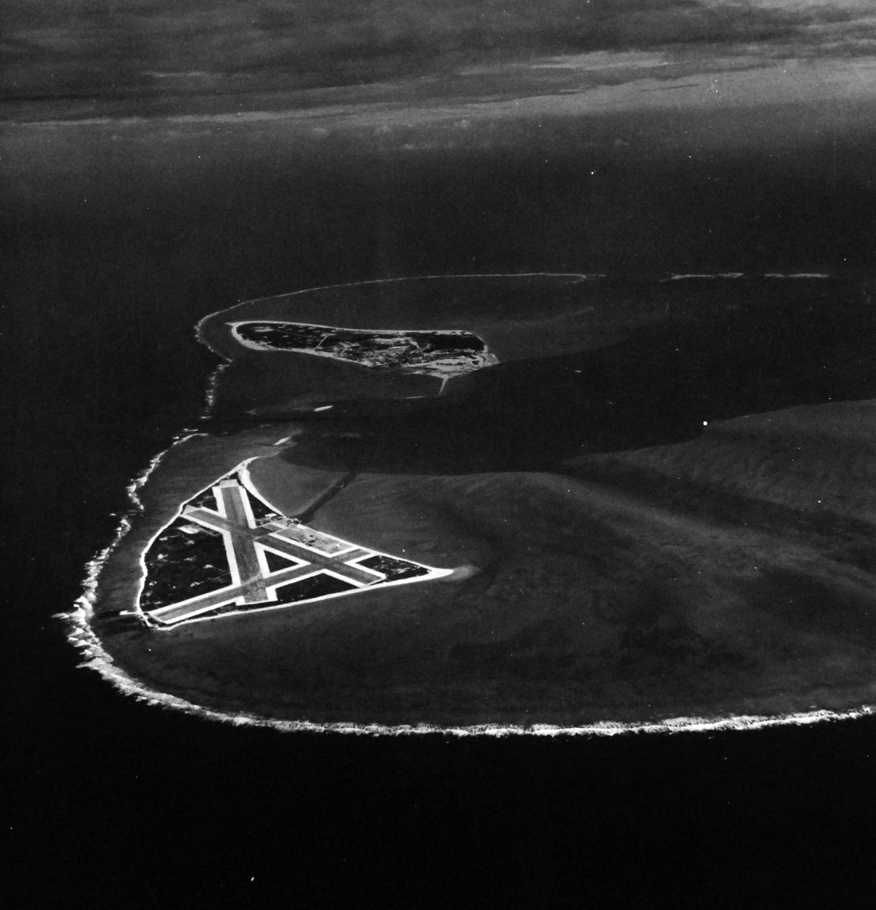 80-G-451086:  Midway Island:  November 1941.   Eastern Island with Sand Island in background looking East.  Photographed by Wolf, November 24, 1941.   U.S. Navy photograph, now in the collections of the National Archives.   (2015/11/03).