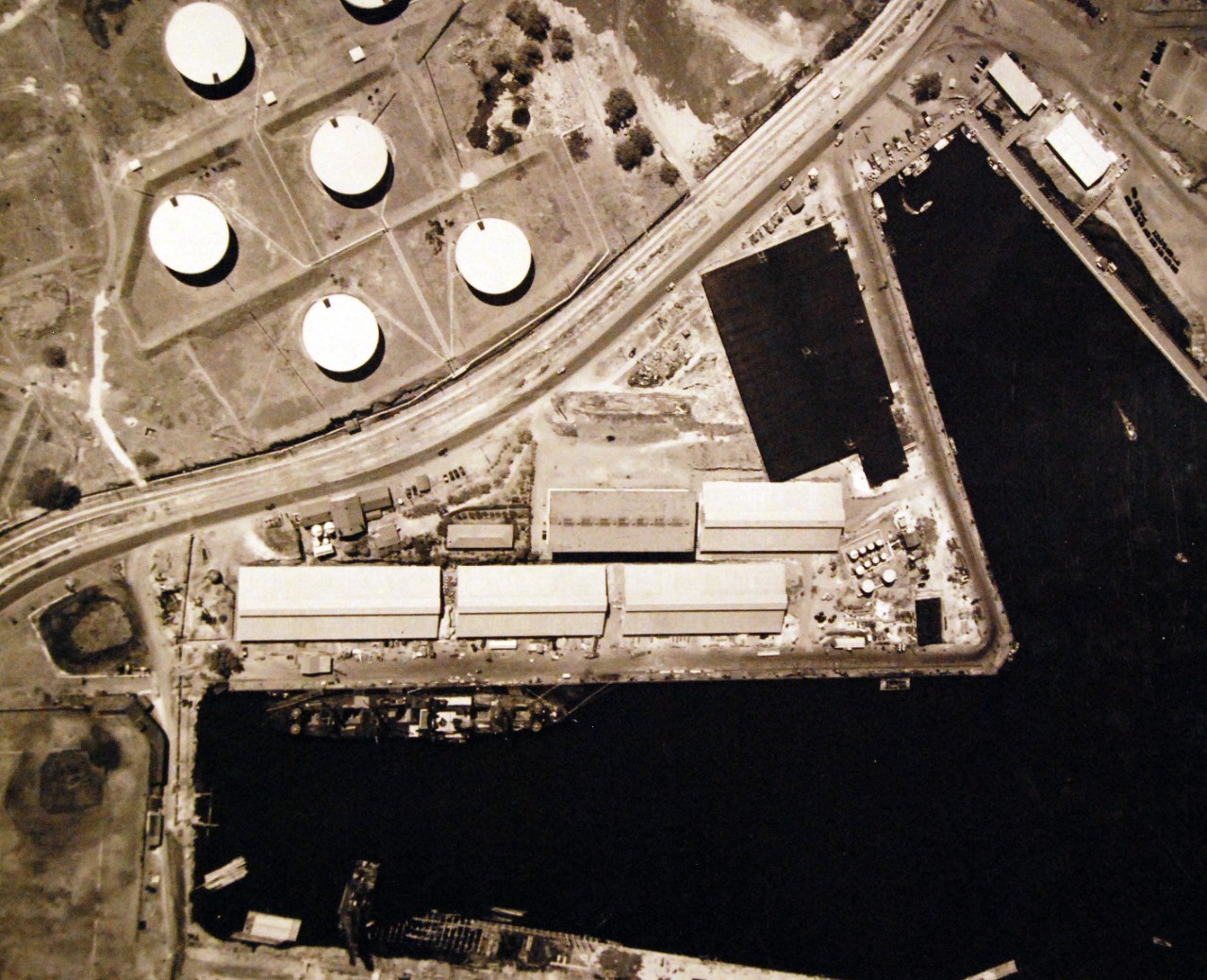 80-G-182877:   Pearl Harbor, Territory of Hawaii, October 16, 1941.   Aerial view showing the fuel depot, Merry Point, and upper tank farm, Navy Yard, Pearl Harbor, taken by aircraft from Naval Air Station, Pearl Harbor. U.S. Navy photograph, now in the collections of the National Archives (9/9/2015).