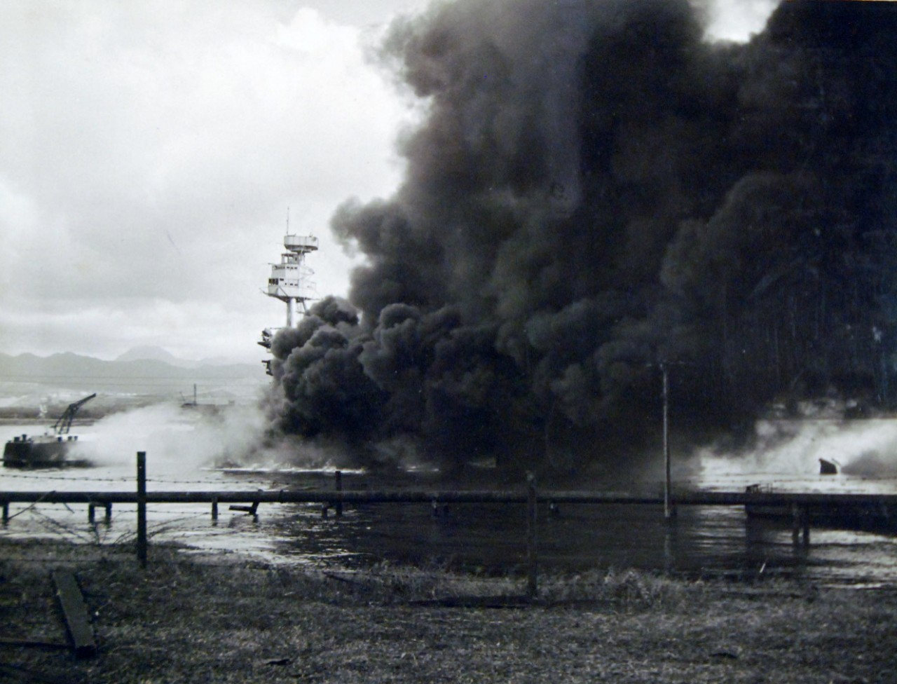 80-G-32560:  Japanese Attack on Pearl Harbor, December 7, 1941.   USS Arizona (BB 39) burning after the Japanese attack.  Official U.S. Navy photograph, now in the collections of the National Archives.      (7/2/2014).